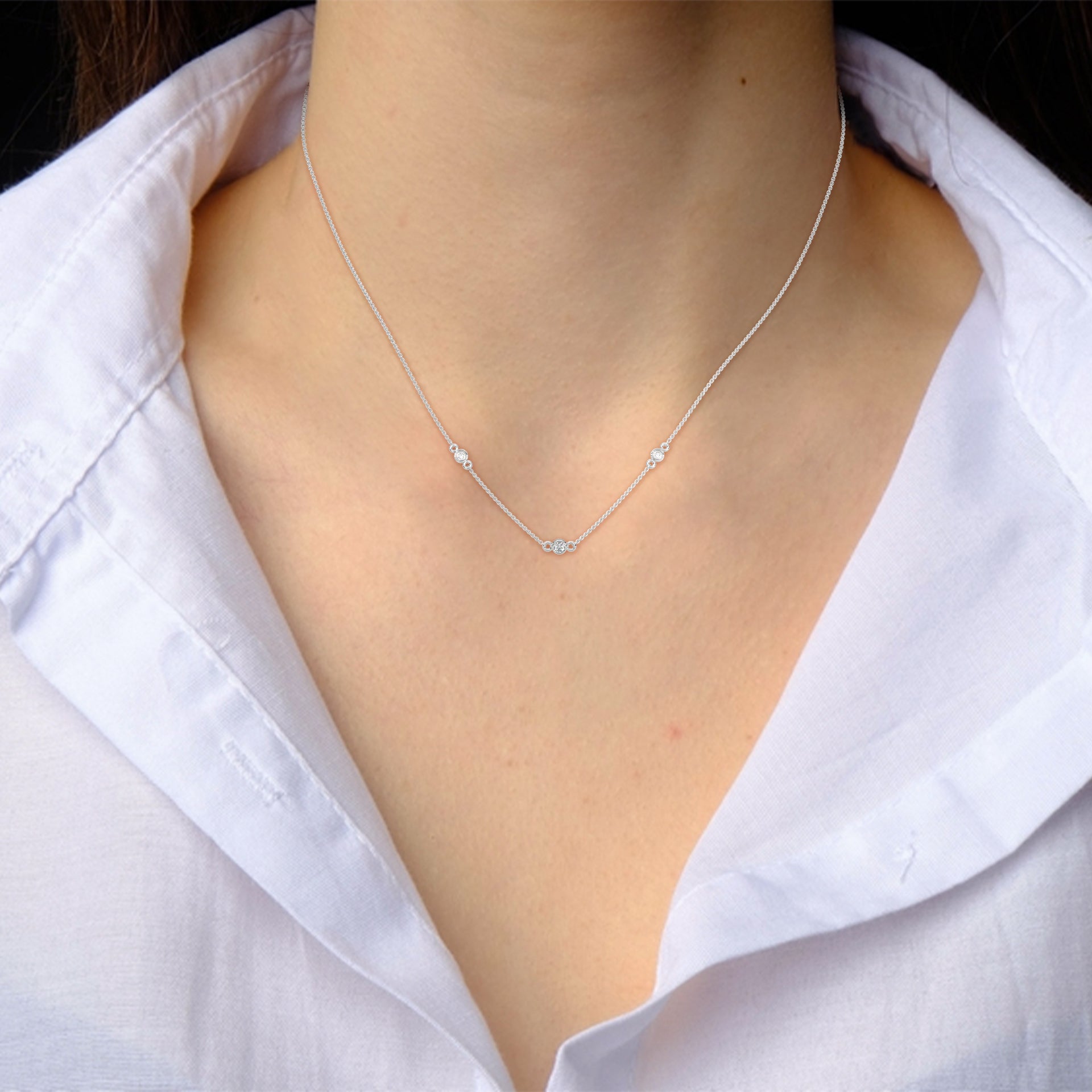 Celestial Harmony: 14K Gold Bezel-Set Diamond Station Necklace