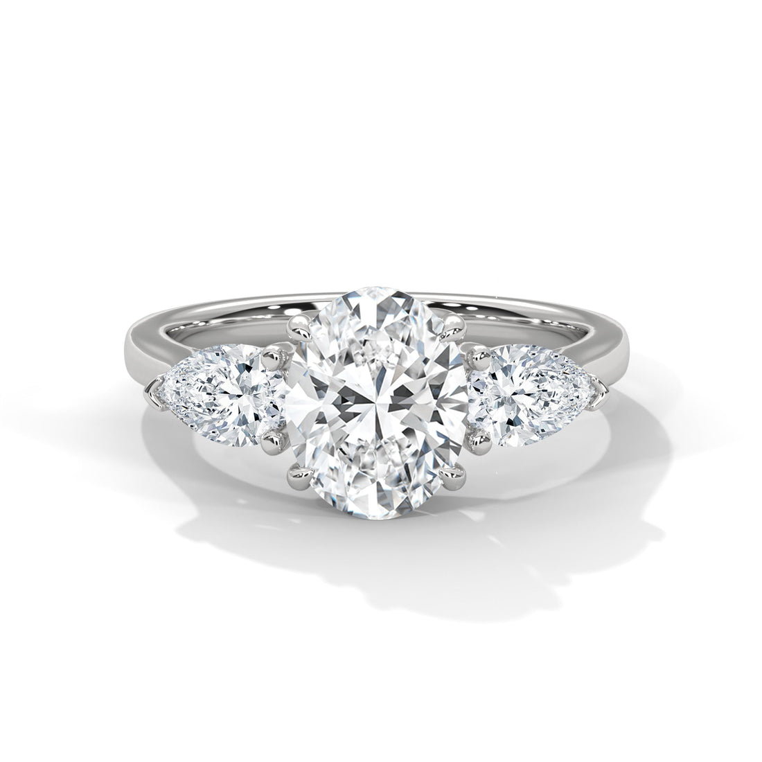 Three-Stone Lab-Grown Diamond Ring 1.5ct Oval with 1/2ct Pear Side Stones | 2.5 CTW